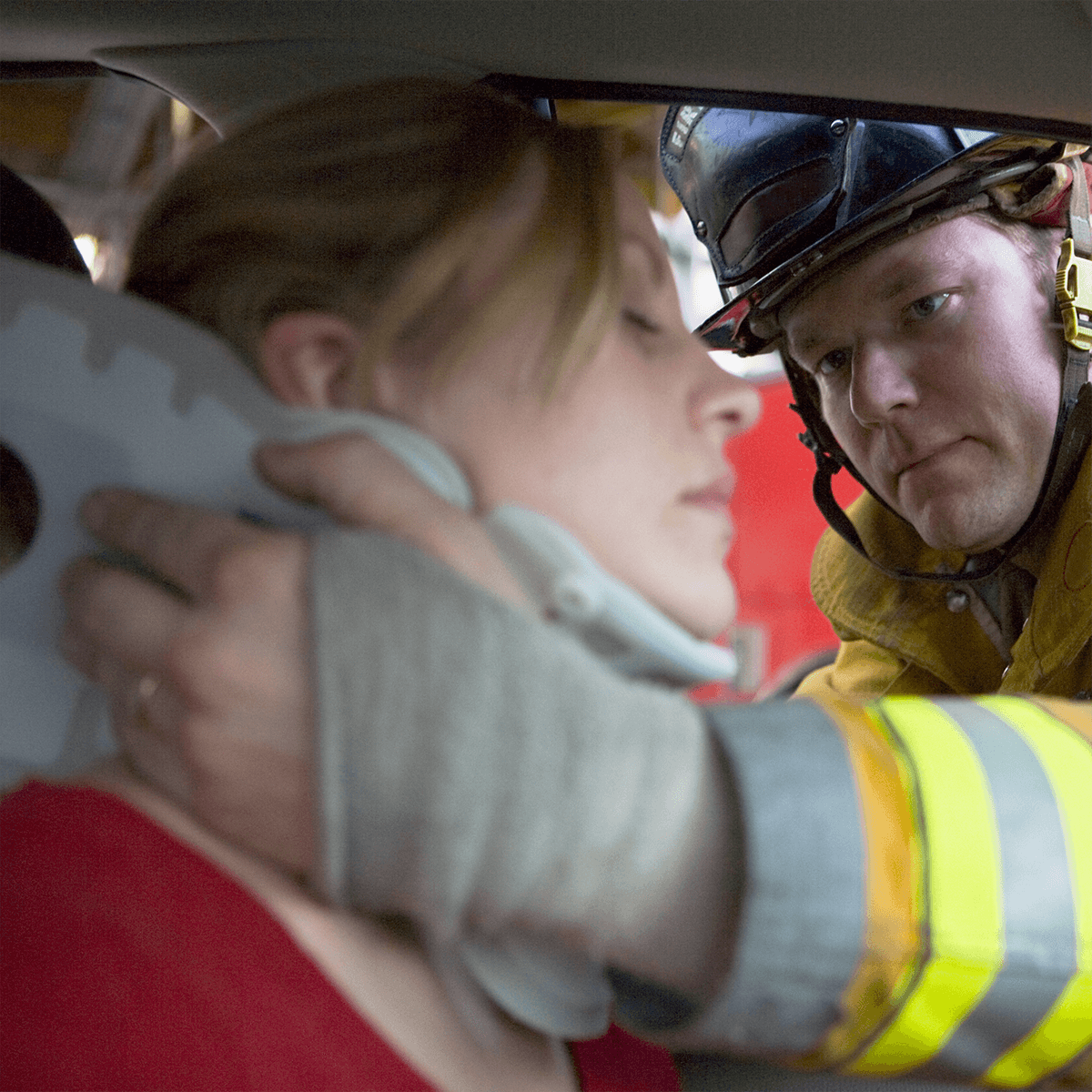 bigstock-Firefighters-Saving-Woman-In-C-3915763